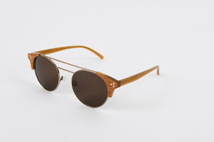 Eco-Friendly wooden sunglasses frame with round prescription lenses and wooden corners and a double titanium bridge 