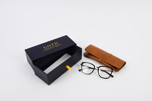 Prescription glasses with box packaging and personalised leather case