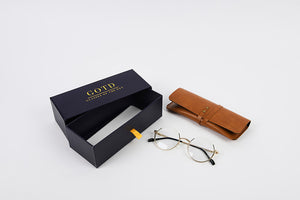 Prescription glasses with box packaging and personalised leather case